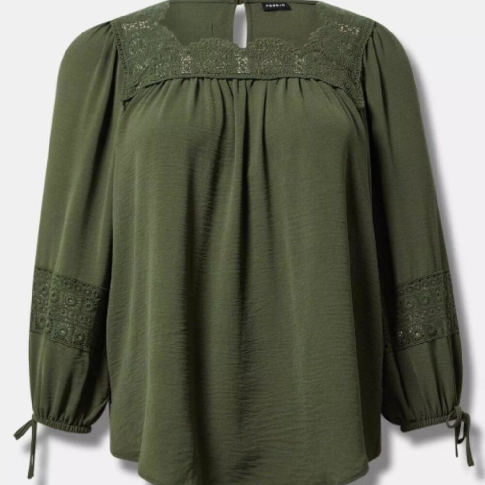 Torrid Camouflage Green  beautiful blouse Crochet Detail on sleeves .
